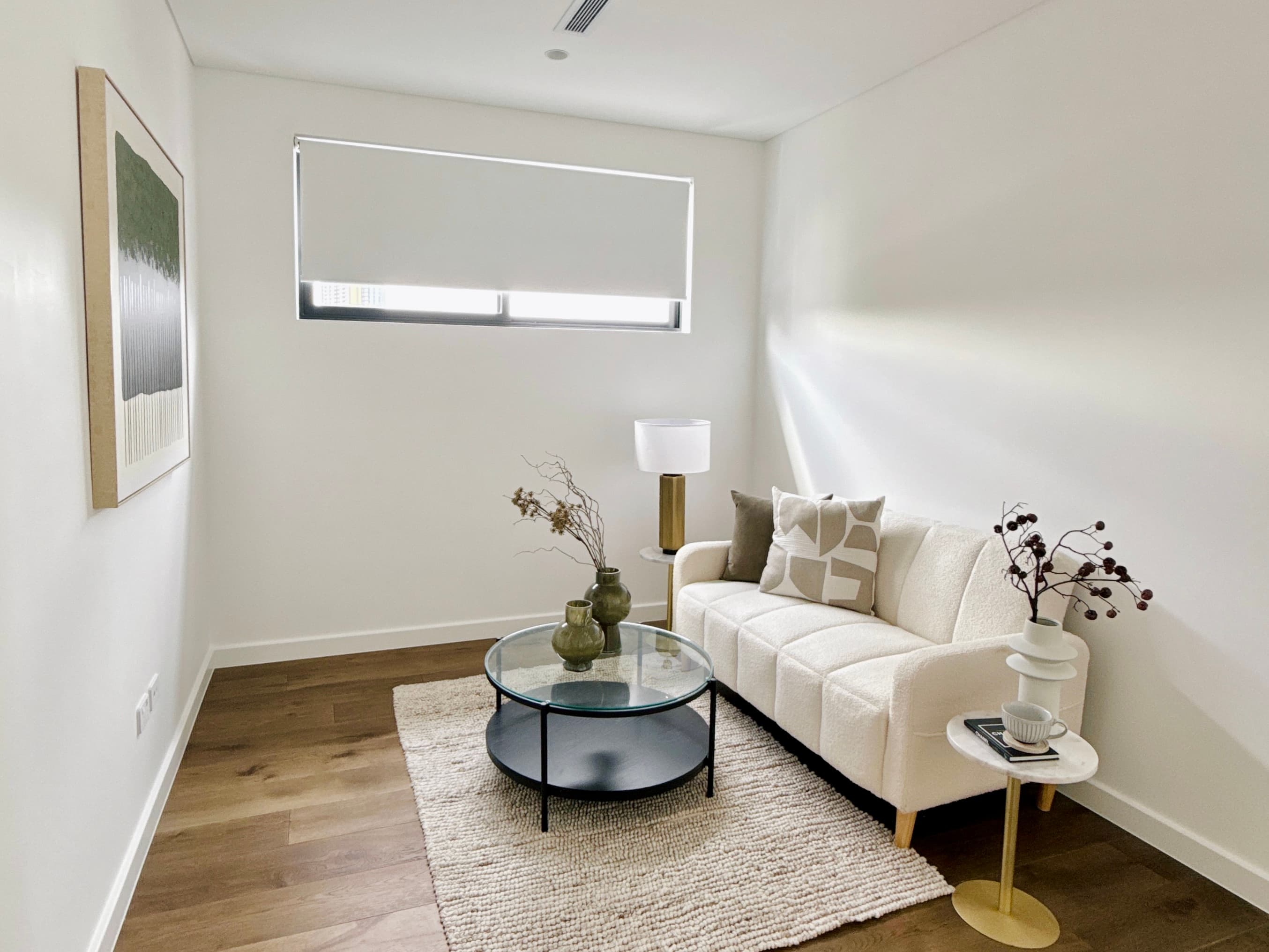 Roller blinds on large windows in a Sydney home