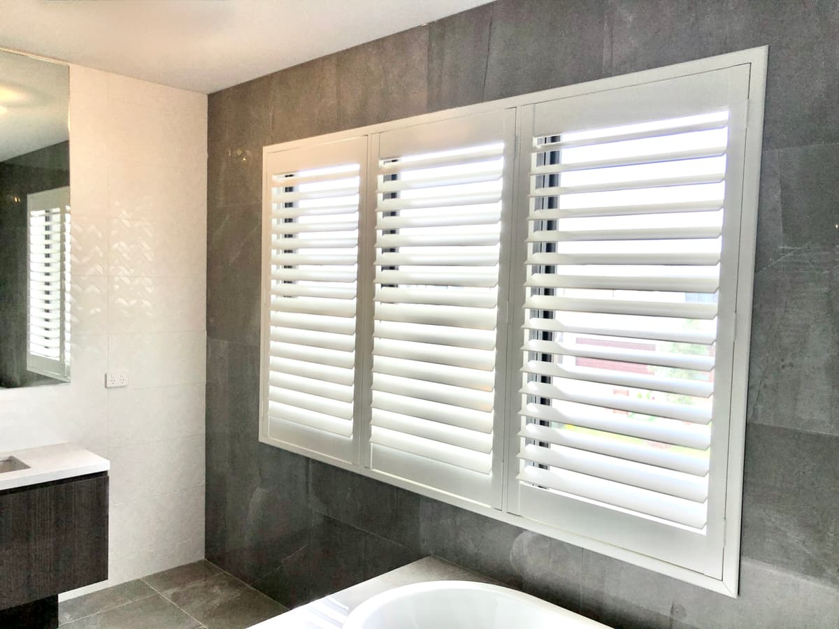 White plantation shutters installed on windows in a Sydney home