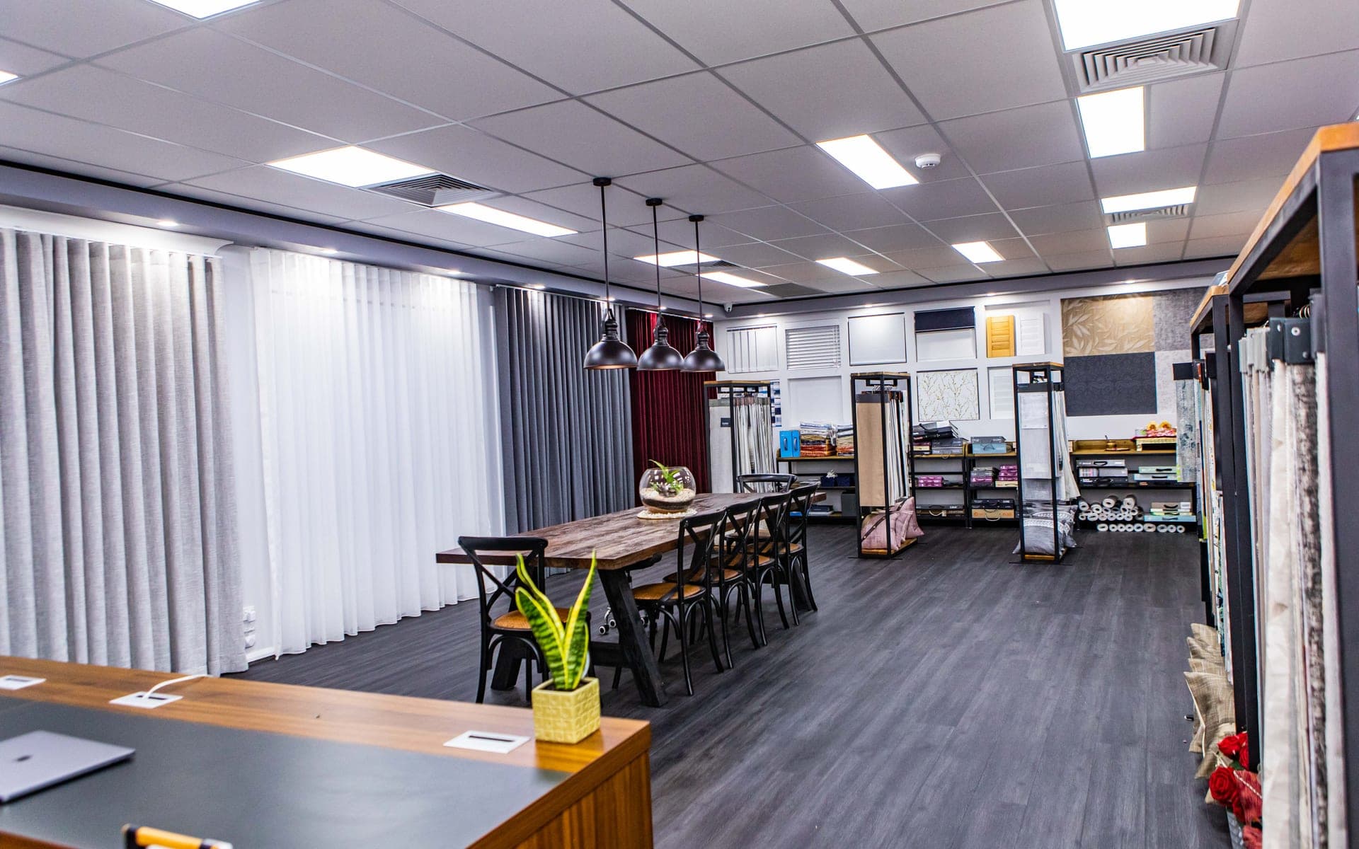 Just Curtains and Blinds showroom interior in Pemulwuy displaying curtain and blind samples