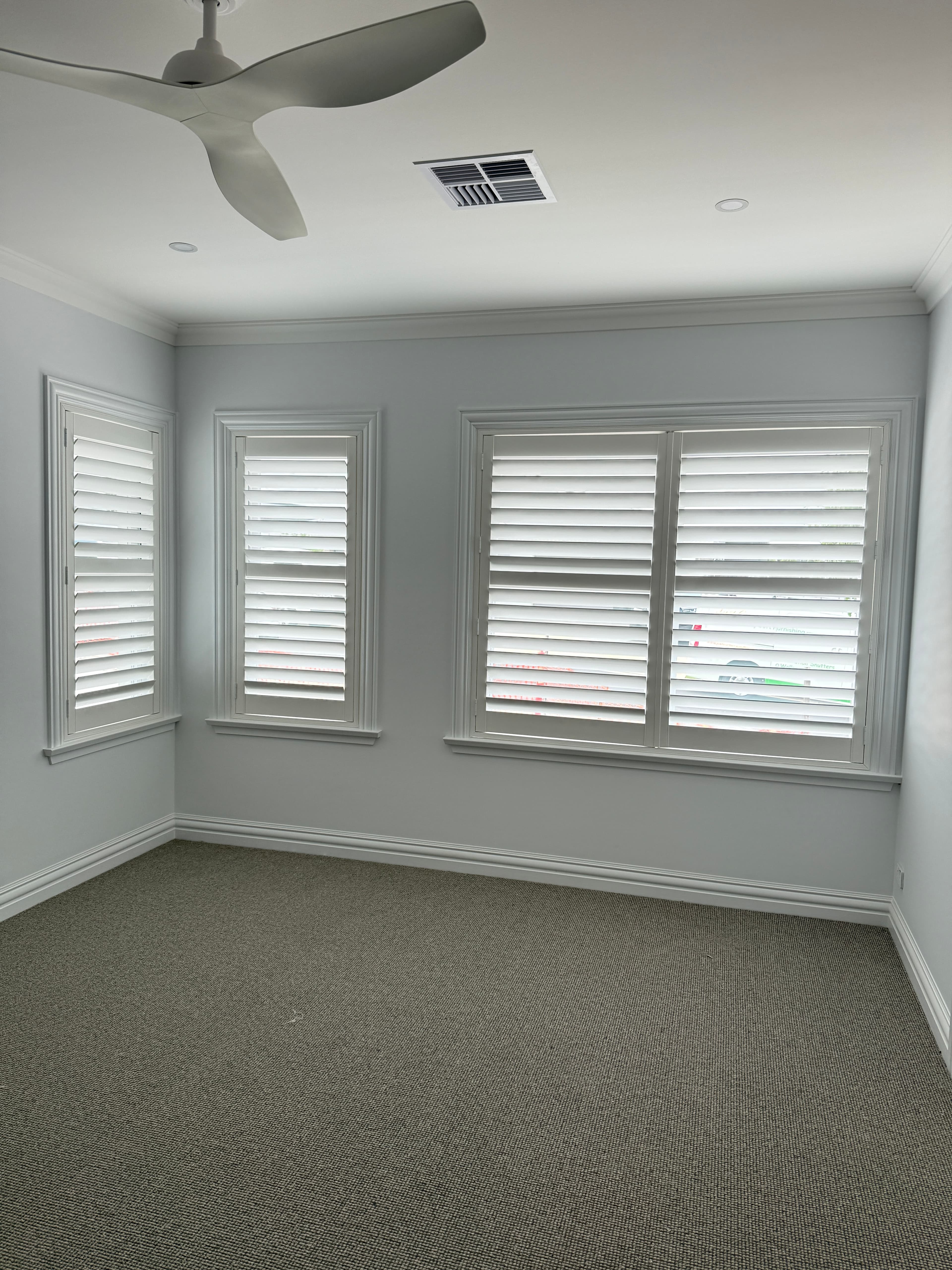 White PVC Plantation Shutters in Glenmore Park, Sydney