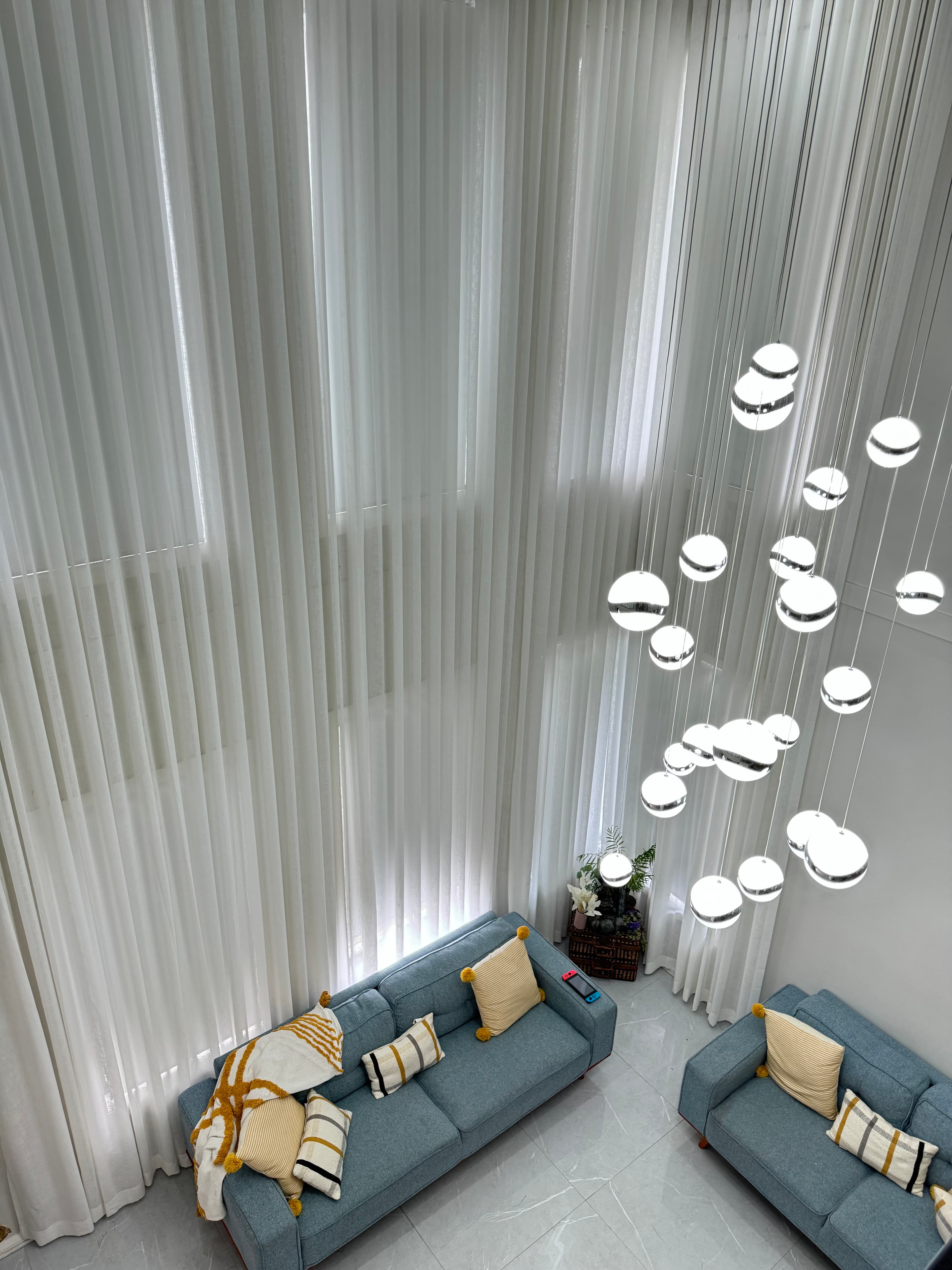 Wave Fold Curtains in Double-Height Void in Kellyville, Sydney